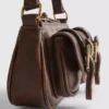 Buckle pocket shoulder bag