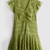 Cotton eyelet ruched mini dress Cotton eyelet ruched mini dress