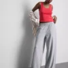 Cotton-rich wide-leg pleated joggers