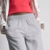 Cotton-rich wide-leg pleated joggers