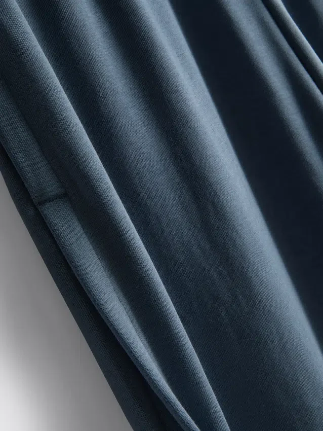 Cotton-rich wide-leg pleated joggers Cotton-rich wide-leg pleated joggers