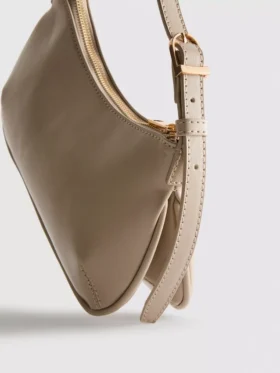 Curved faux leather shoulder bag
