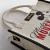 Disney’s mickey and friends faux leather tote bag