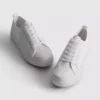 Embroidered daisy sneakers