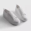 Embroidered daisy sneakers