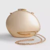 Paula echevarría metallic oval crossbody bag Paula echevarría metallic oval crossbody bag