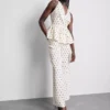 Polka dot halter neck peplum top Polka dot halter neck peplum top