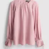 Textured balloon-sleeve blouse Textured balloon-sleeve blouse