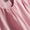 Textured balloon-sleeve blouse Textured balloon-sleeve blouse