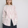 The edit cotton-rich striped poplin shirt The edit cotton-rich striped poplin shirt