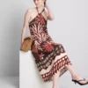 The edit linen-blend printed halter midi dress The edit linen-blend printed halter midi dress
