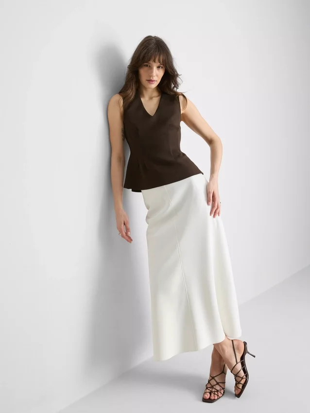 V-neck peplum sleeveless top V-neck peplum sleeveless top