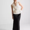 V-neck peplum sleeveless top V-neck peplum sleeveless top
