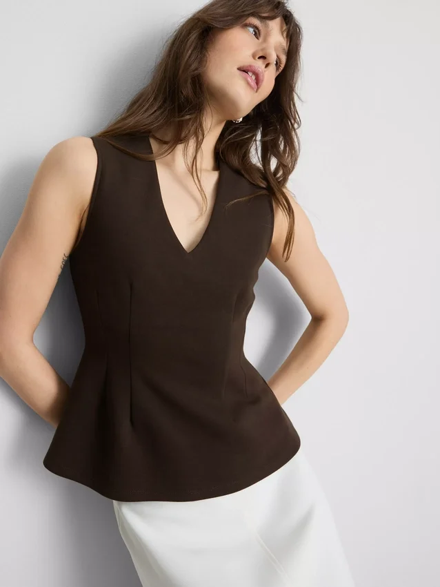 V-neck peplum sleeveless top V-neck peplum sleeveless top