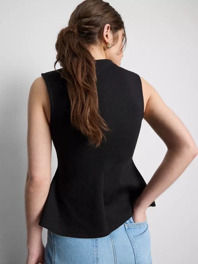 V-neck peplum sleeveless top V-neck peplum sleeveless top