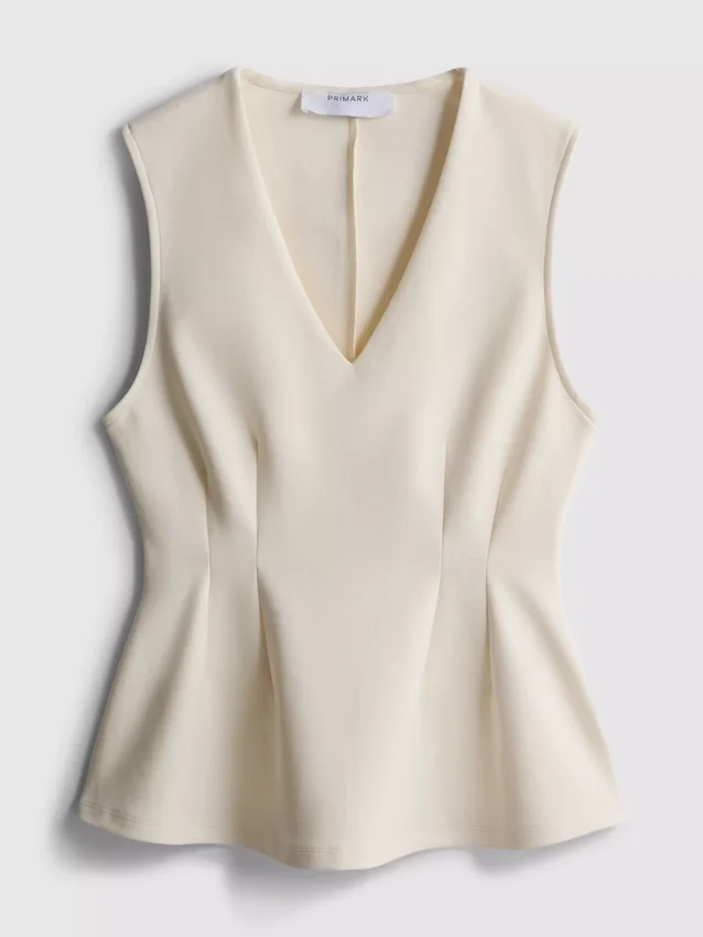 V-neck peplum sleeveless top V-neck peplum sleeveless top