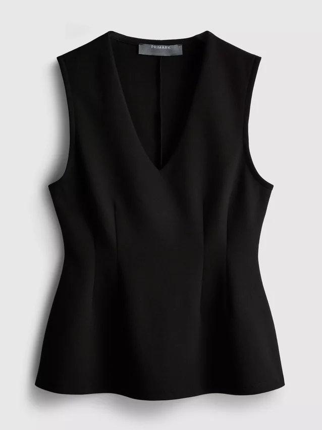 V-neck peplum sleeveless top V-neck peplum sleeveless top