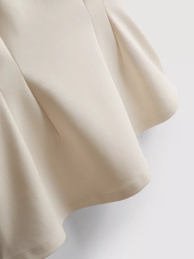 V-neck peplum sleeveless top V-neck peplum sleeveless top